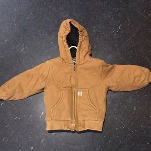Tan Carhartt thick winter jacket, can be unisex.